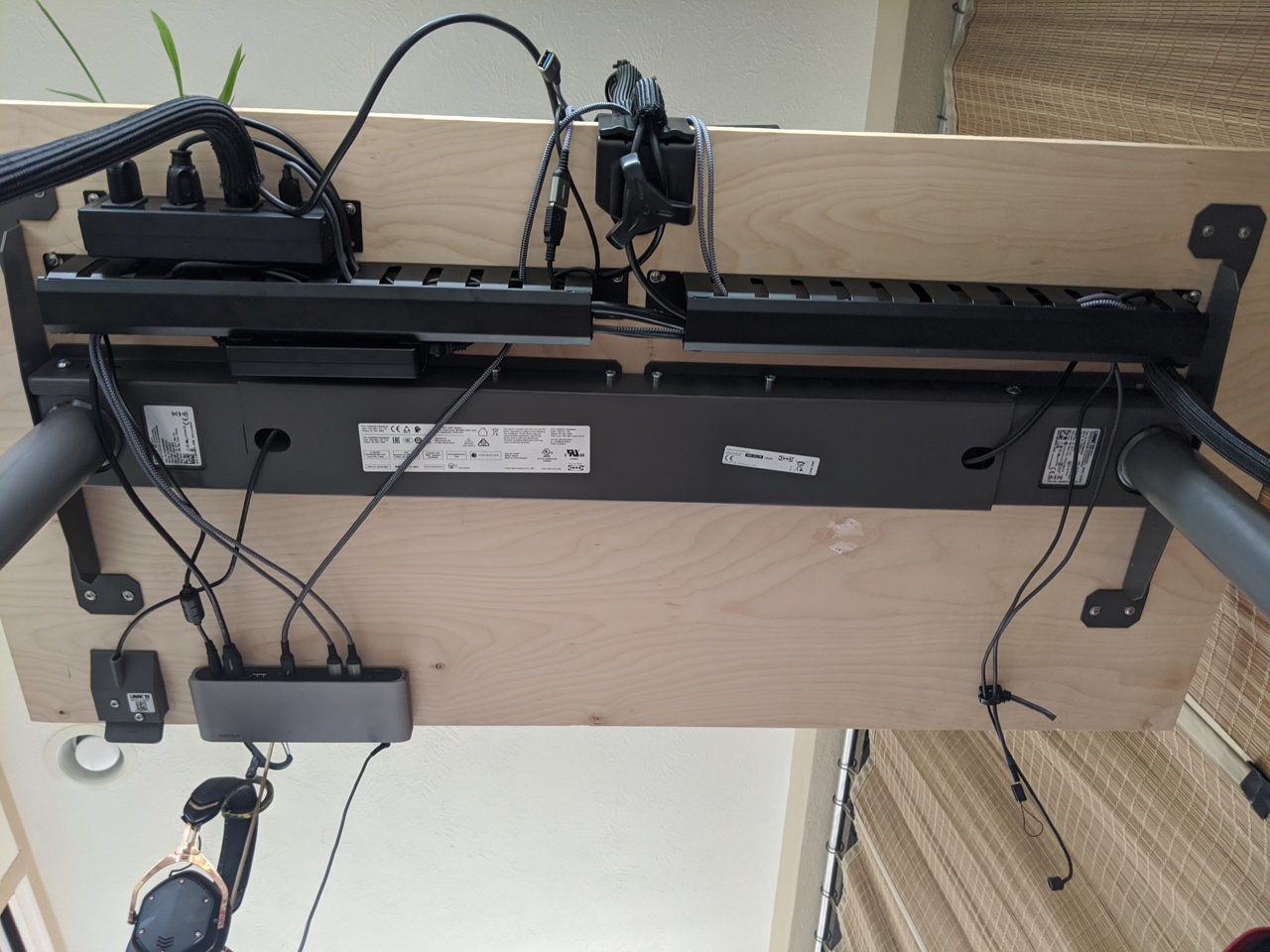 underside of desk, cables covered