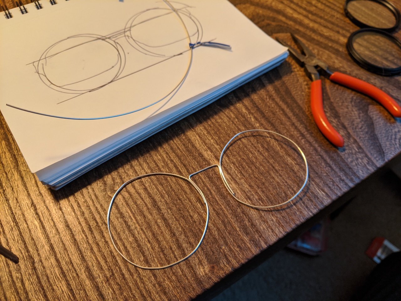 wire formed to initial shape for glasses